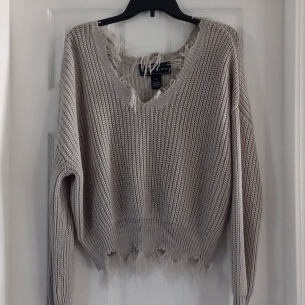 Grey distressed sweater